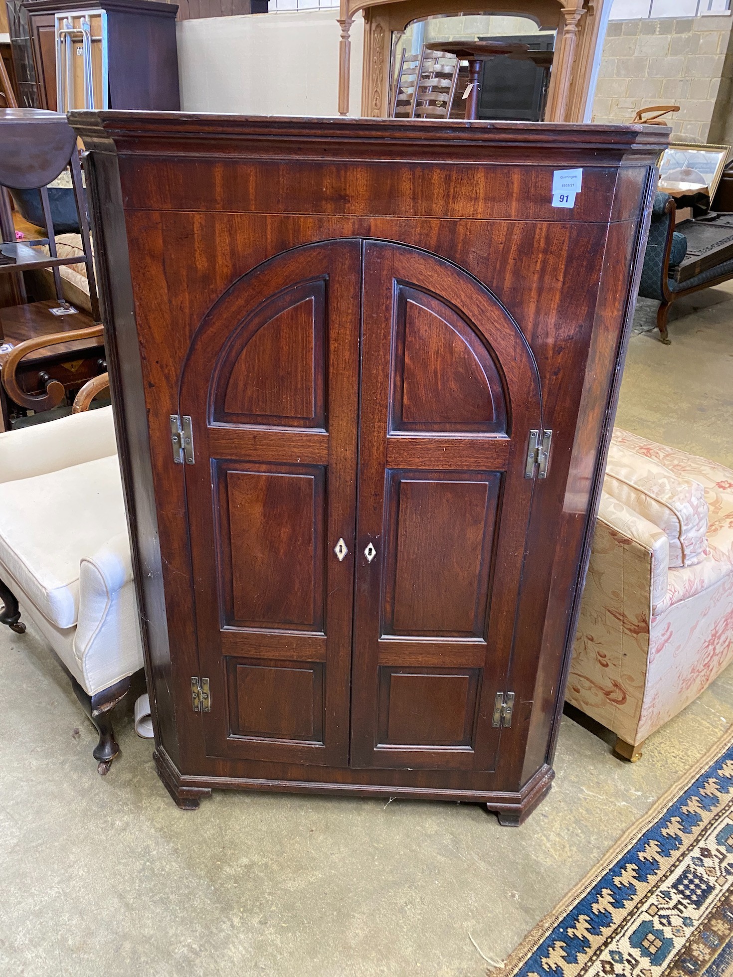 A George III mahogany corner cabinet, width 92cm, depth 51cm, height 138cm